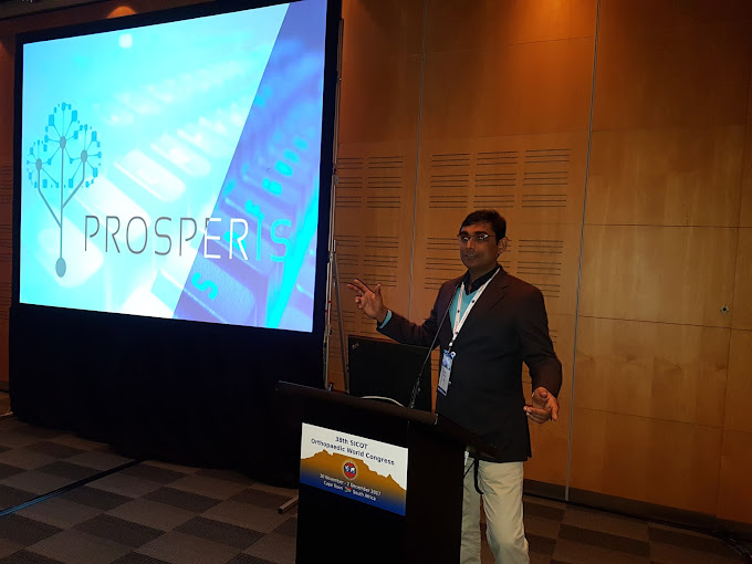 Dr. Girish Gupta during a consultation